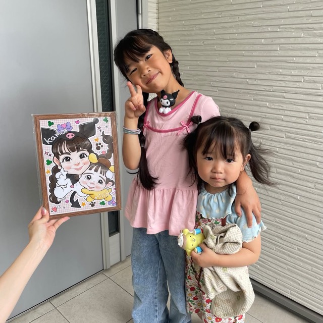 姉妹の似顔絵